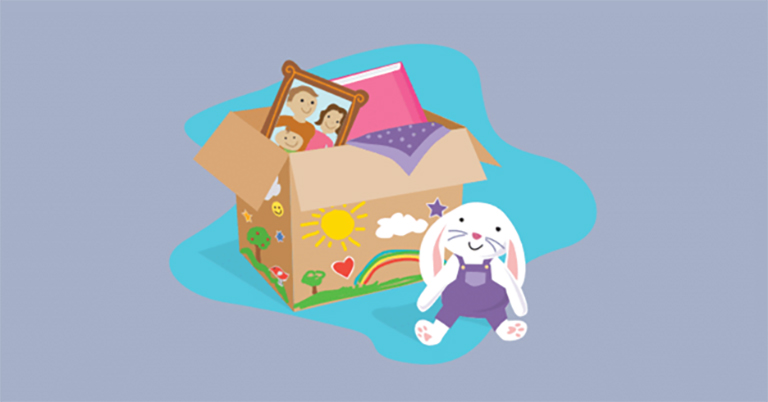 A decorated cardboard box full of keepsakes and personalized gifts.