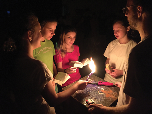 Kids doing a nighttime activity at camp