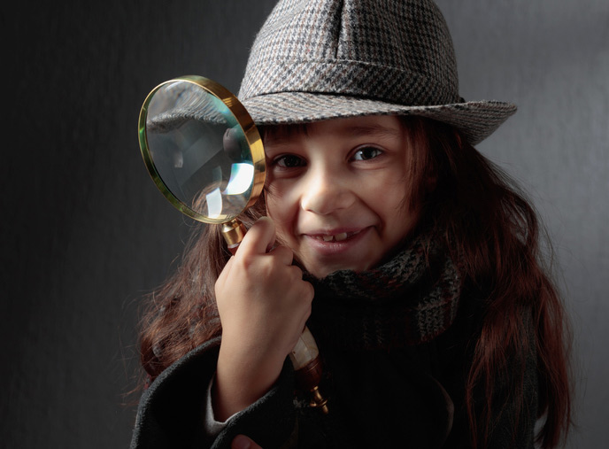 A girl dressed as a detective