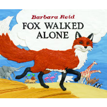 A fox is walking alone with many other animals far in the background.