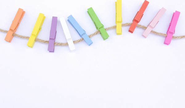 colorful clothes pins on a piece of twine