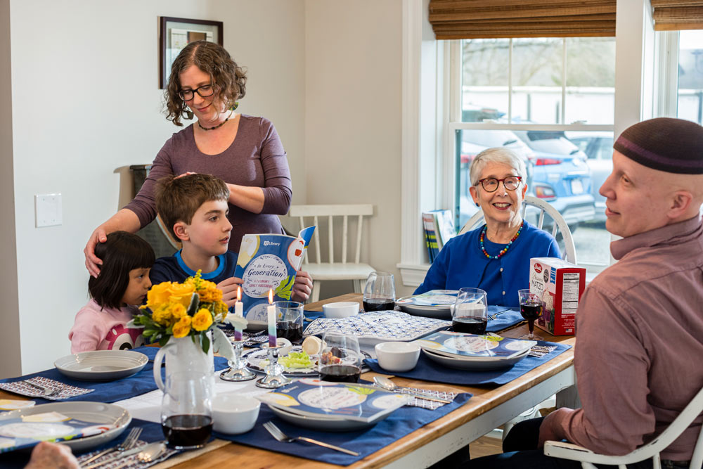 Family at dinner table during Passover seder