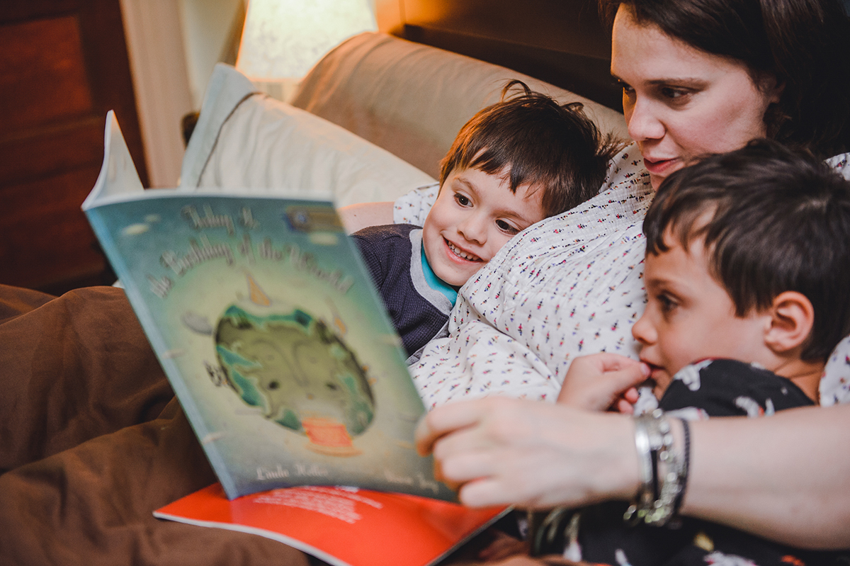 Mom Reading with Sons