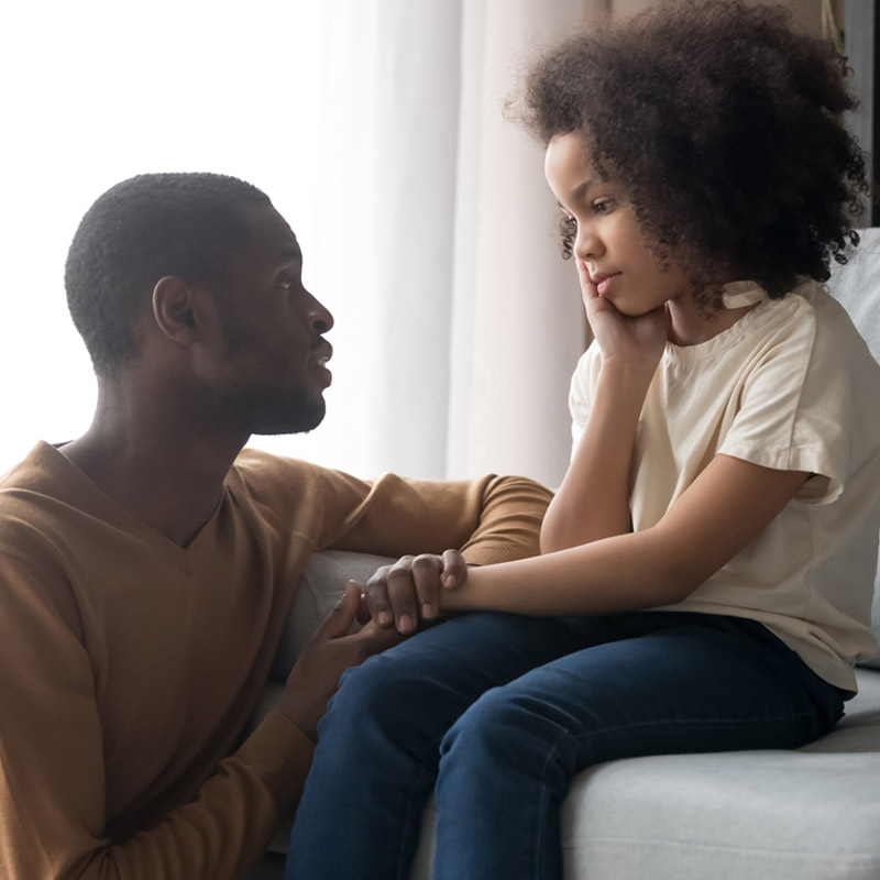 A parent talking to a child