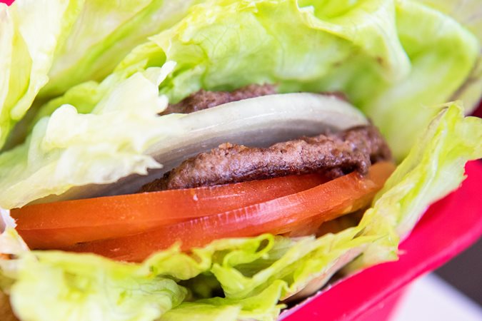 Turkey burger wrapped in lettuce