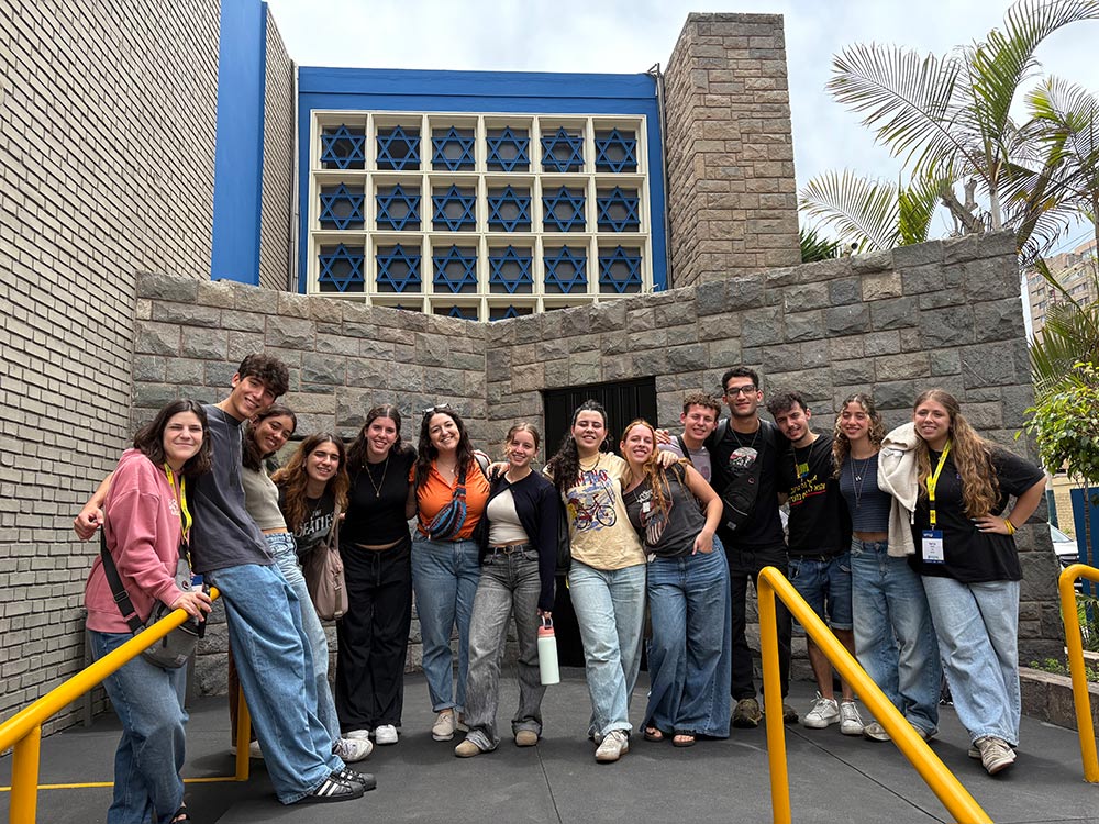 A group of people gathered at a conference in Peru