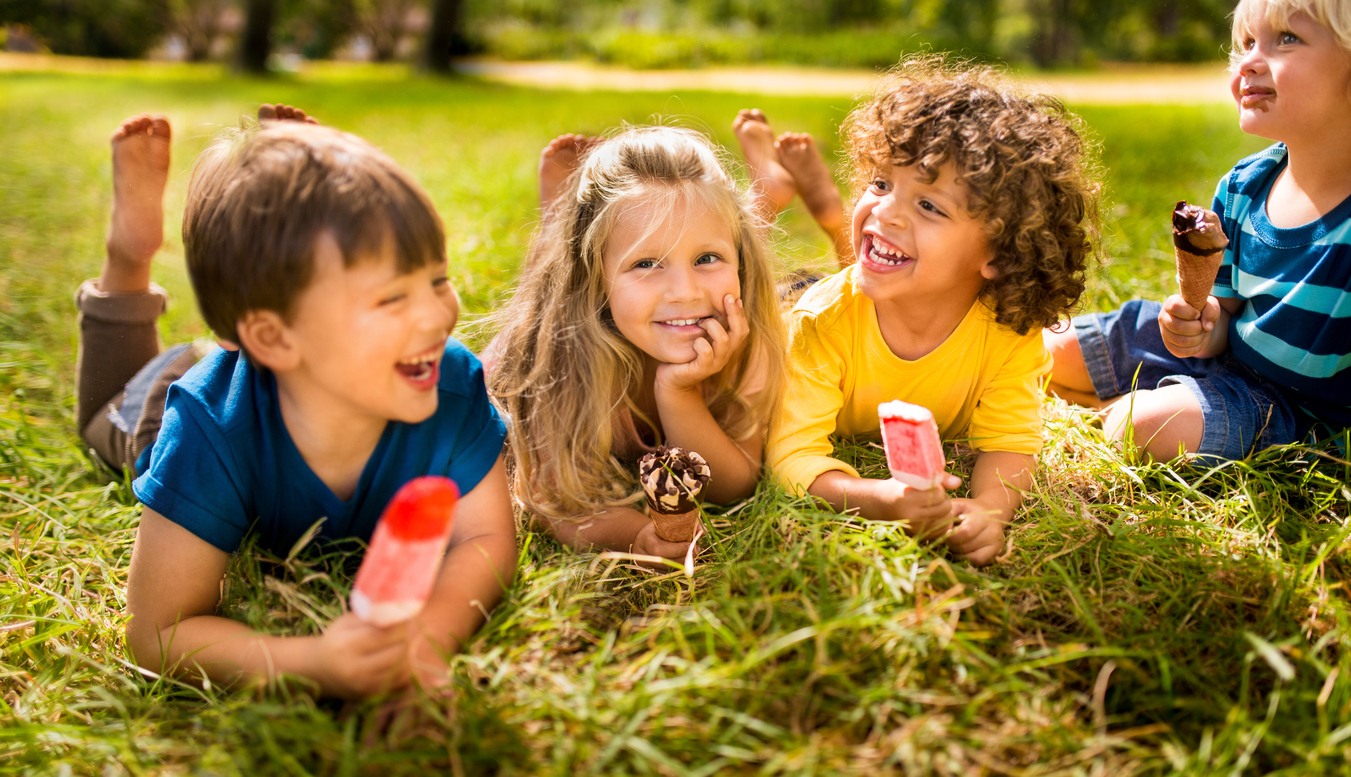 Friends enjoying ice cream and popsicles