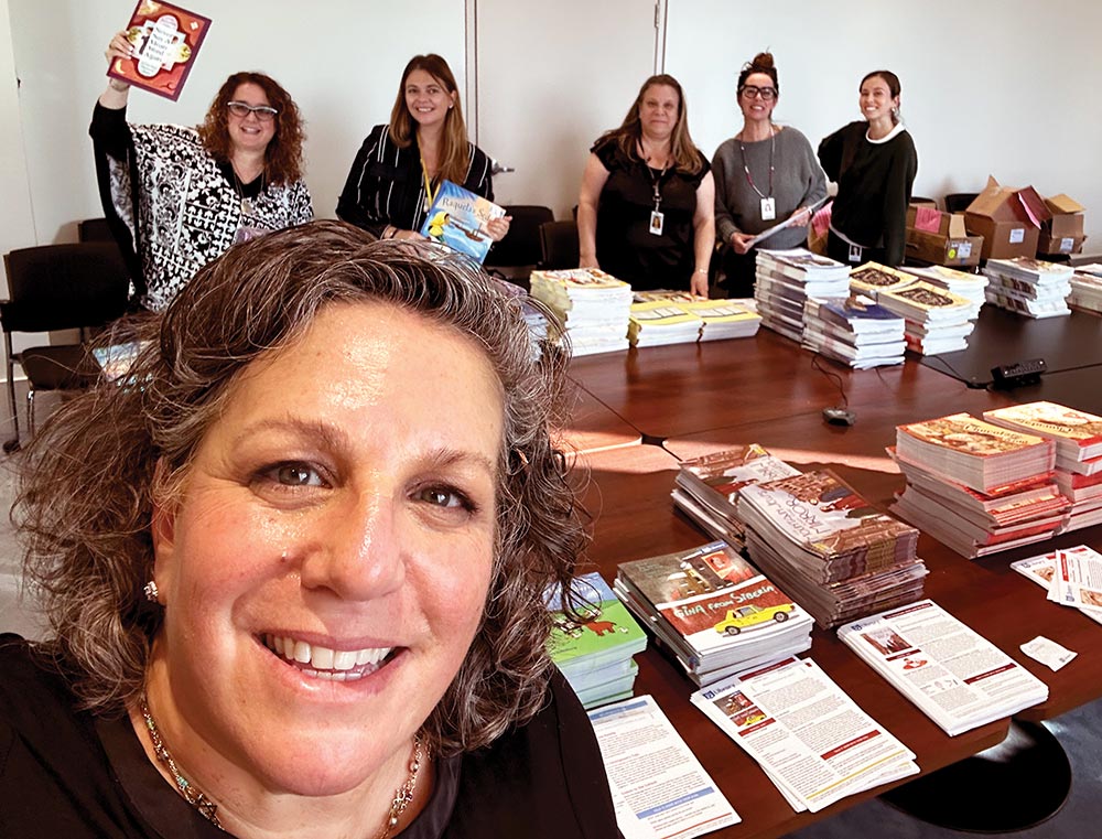 Group around conference table
                        