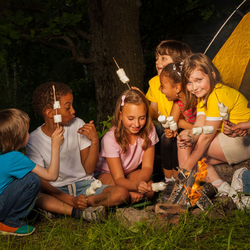 Kids roasting marshmellows