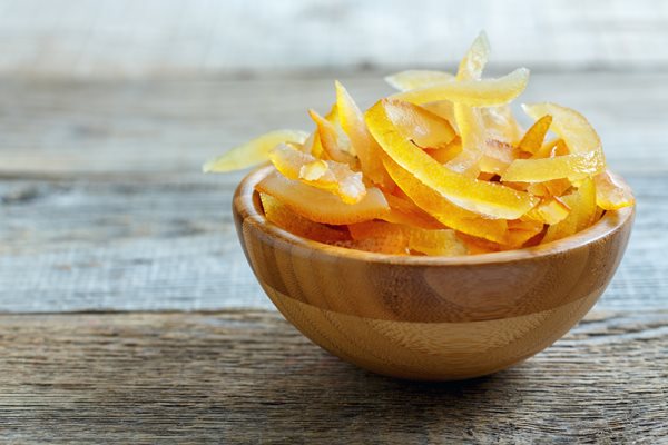 a bowl of candied citrus peels
