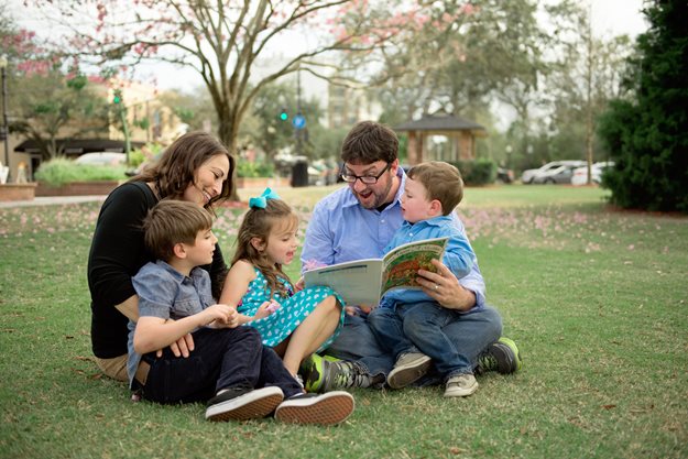 A PJ Family having a "reading picnic"