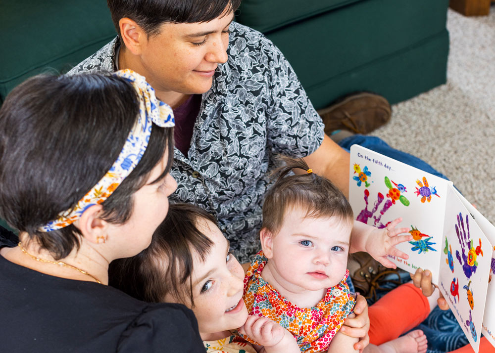 Parents reading to their children