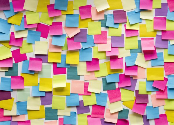 A wall covered in sticky notes