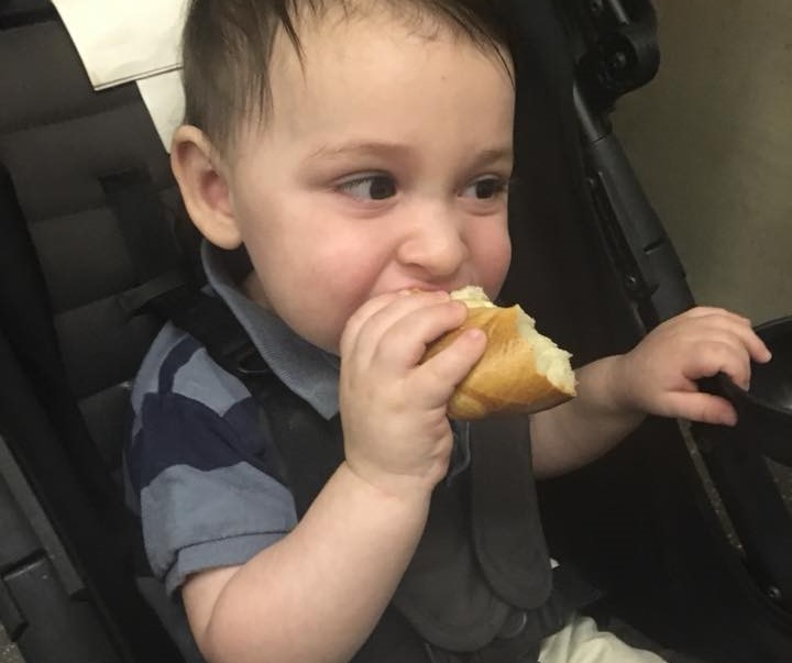 little boy eating challah